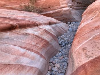 Close up of striped sandstone boulders at ground level