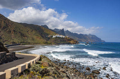 Scenic view of beach against sky