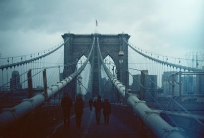 View of bridge against cloudy sky