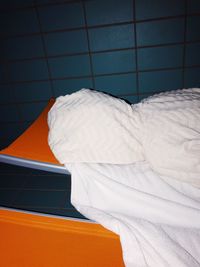 Close-up of white bed