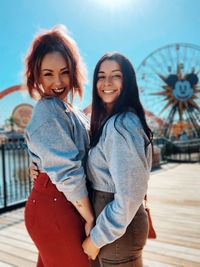 Beautiful young woman in amusement park