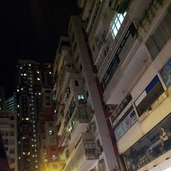 Low angle view of buildings at night