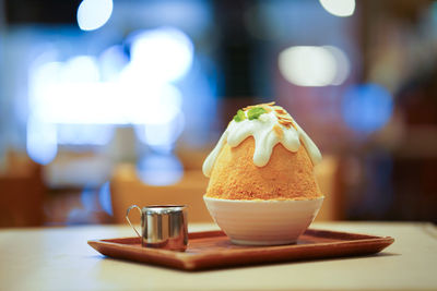 Close-up of cake and coffee on table