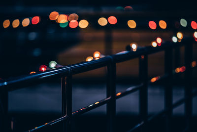 Defocused image of illuminated lights at night