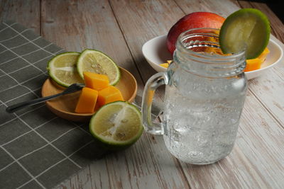 Fruits in glass on table