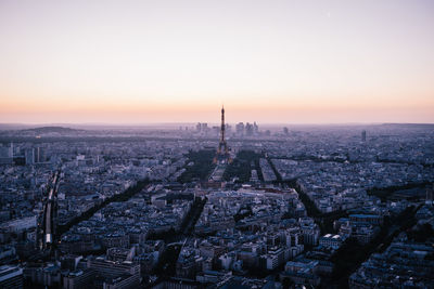 High angle view of city against sky during sunset