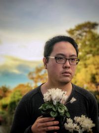 Portrait of young man wearing eyeglasses