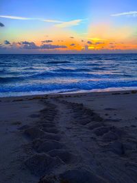 Scenic view of sea against sky during sunset