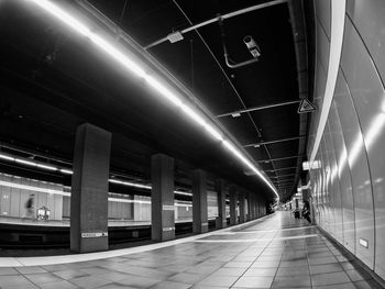 Illuminated railroad station at night