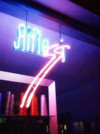 Low angle view of illuminated lights at night