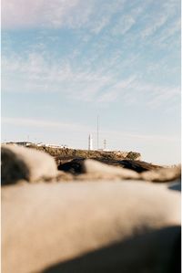 Surface level of beach against sky