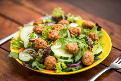 Close-up of food served on table