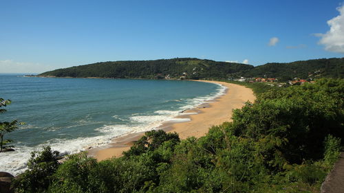 View of calm beach against the sky