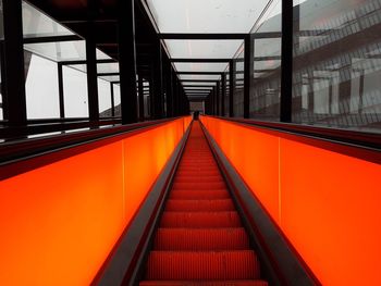 Close-up of red metal railing