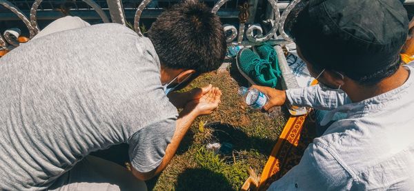 High angle view of people sitting outdoors
