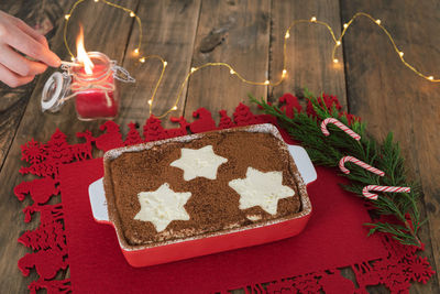 Close-up of hand holding ice cream cone