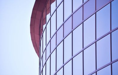 Low angle view of skyscrapers against clear sky