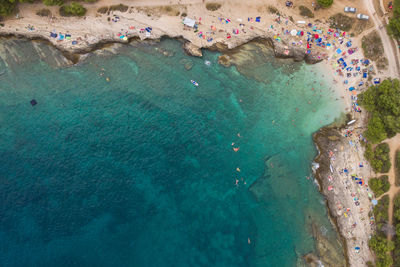 High angle view of rocks in sea