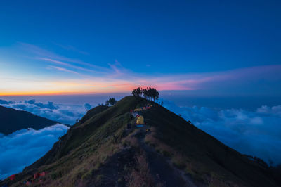 Scenic view of mountains against sky during sunset