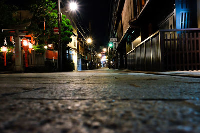 Surface level of illuminated street lights at night