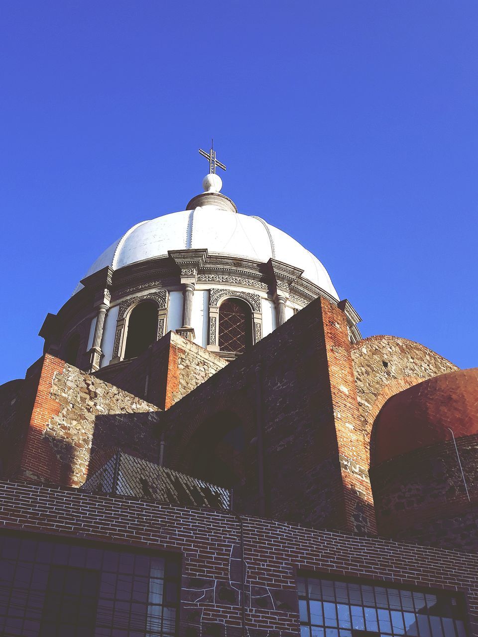 LOW ANGLE VIEW OF BELL TOWER AGAINST CLEAR SKY