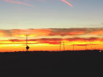 Silhouette of landscape against dramatic sky