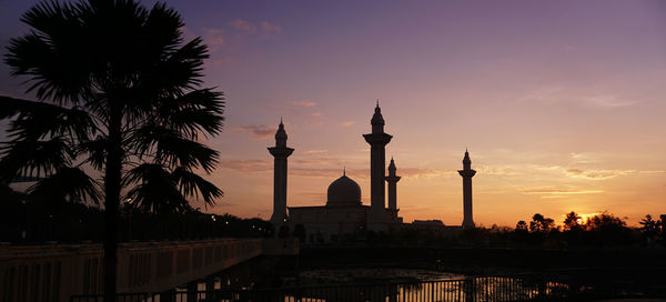 Silhouette of buildings at sunset
