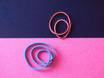 High angle view of rubber bands on table