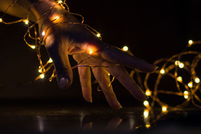 Close-up of illuminated light bulb