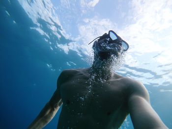 Man swimming in sea