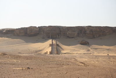 View of desert against clear sky