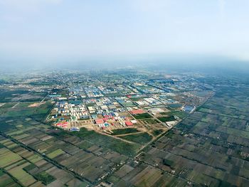 Aerial view of city against sky