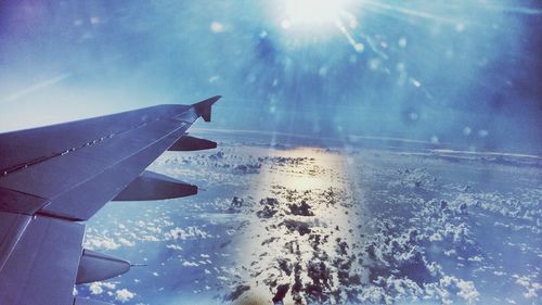 Aerial view of landscape against blue sky
