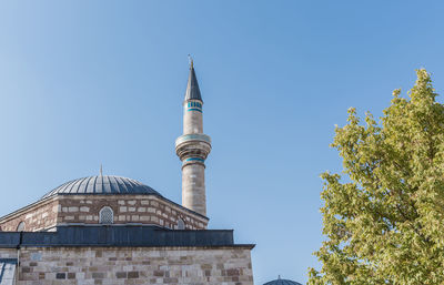 Low angle view of building against clear blue sky