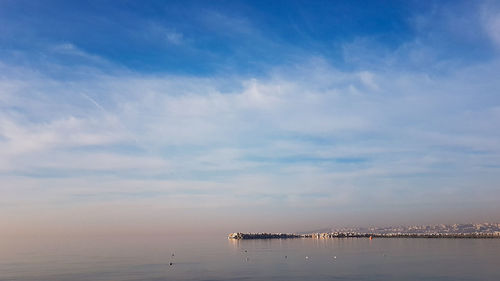 Scenic view of sea against sky at sunset