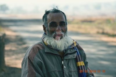 Portrait of man wearing mask outdoors