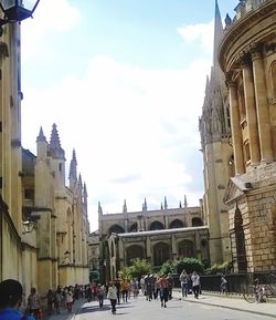 Tourists in front of building