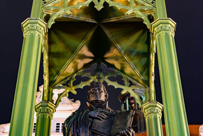 Low angle view of statue of historic building