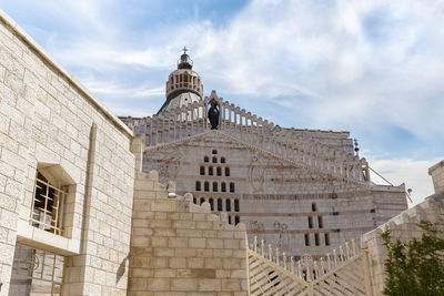 Low angle view of historic building against sky