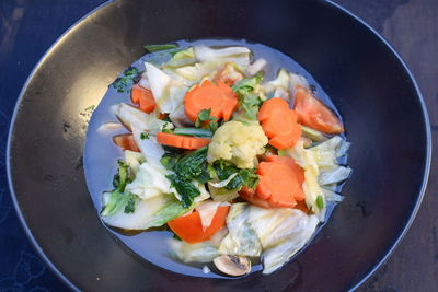 High angle view of mushroom capcay served in bowl