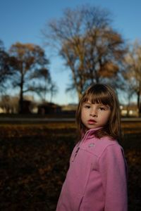 Close-up portrait of girl in park