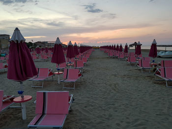 Scenic view of beach against sky during sunset