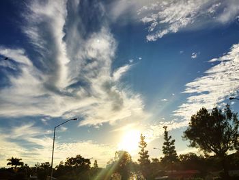 Sun shining through clouds