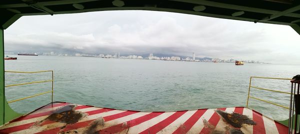 Scenic view of sea seen from ferry terminal