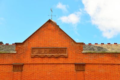 Low angle view of public library against sky