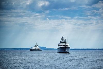 Ship in sea against sky