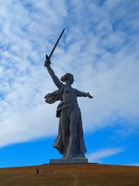 Low angle view of statue against sky