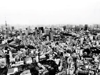 Aerial view of cityscape against clear sky