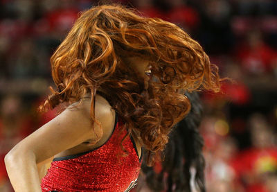 Close-up portrait of woman with red hair