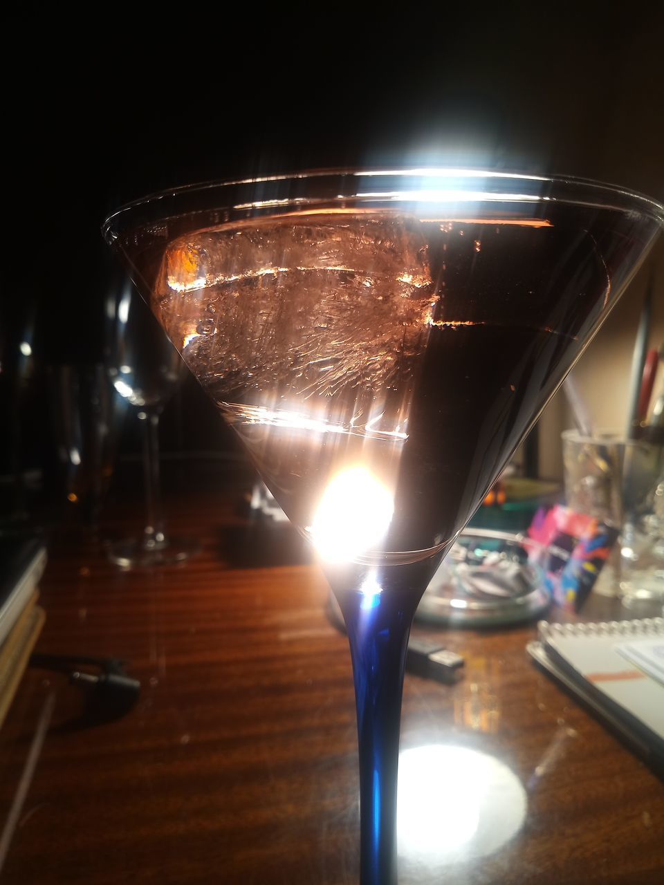 CLOSE-UP OF WINE GLASS ON TABLE IN RESTAURANT